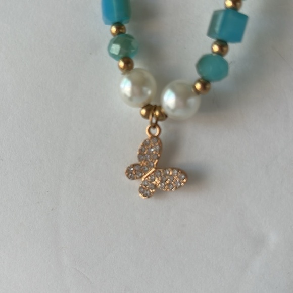 Handmade Stretchy Turquoise And Faux Pearl Beaded Bracelet With Butterfly Charm - Picture 3 of 3
